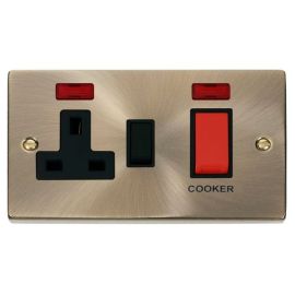 Click VPAB205BK Deco Antique Brass 45A Cooker Switch Unit with 13A 2 Pole Neon - Switched Socket Black Insert image